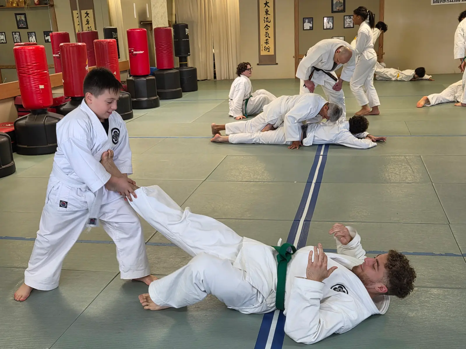 A controlled takedown during training