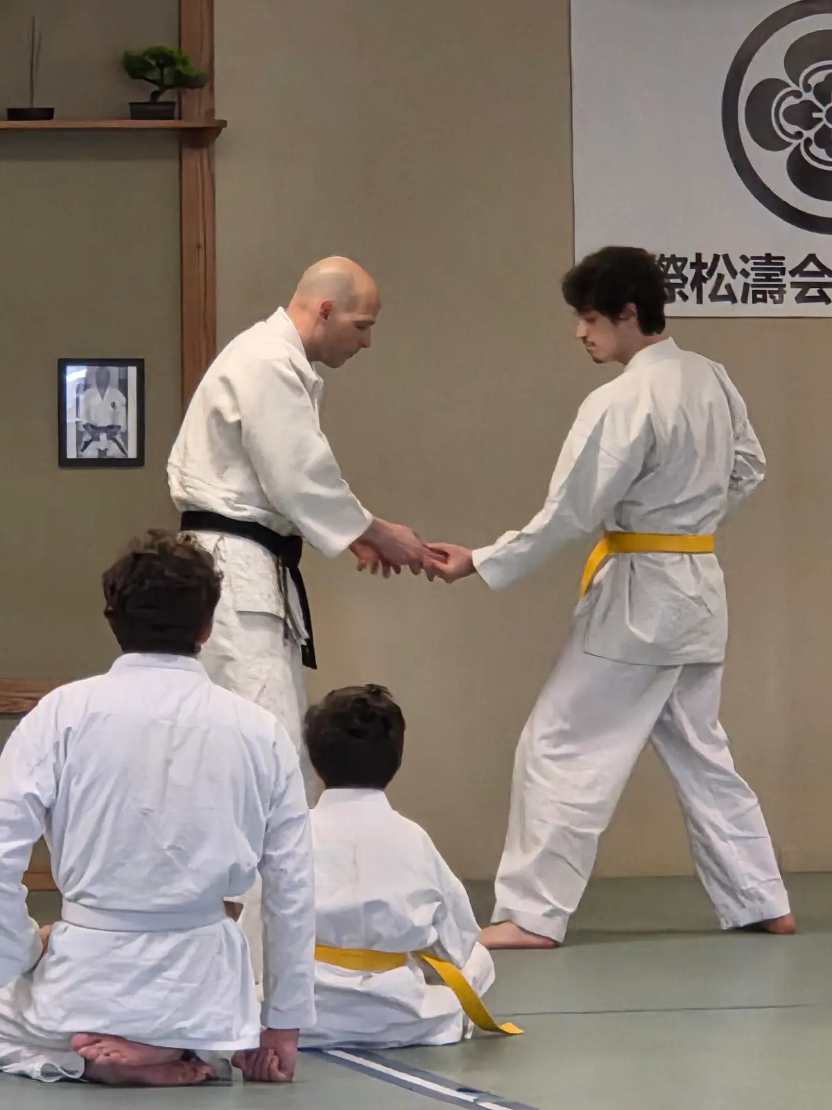 Partner work with a training weapon