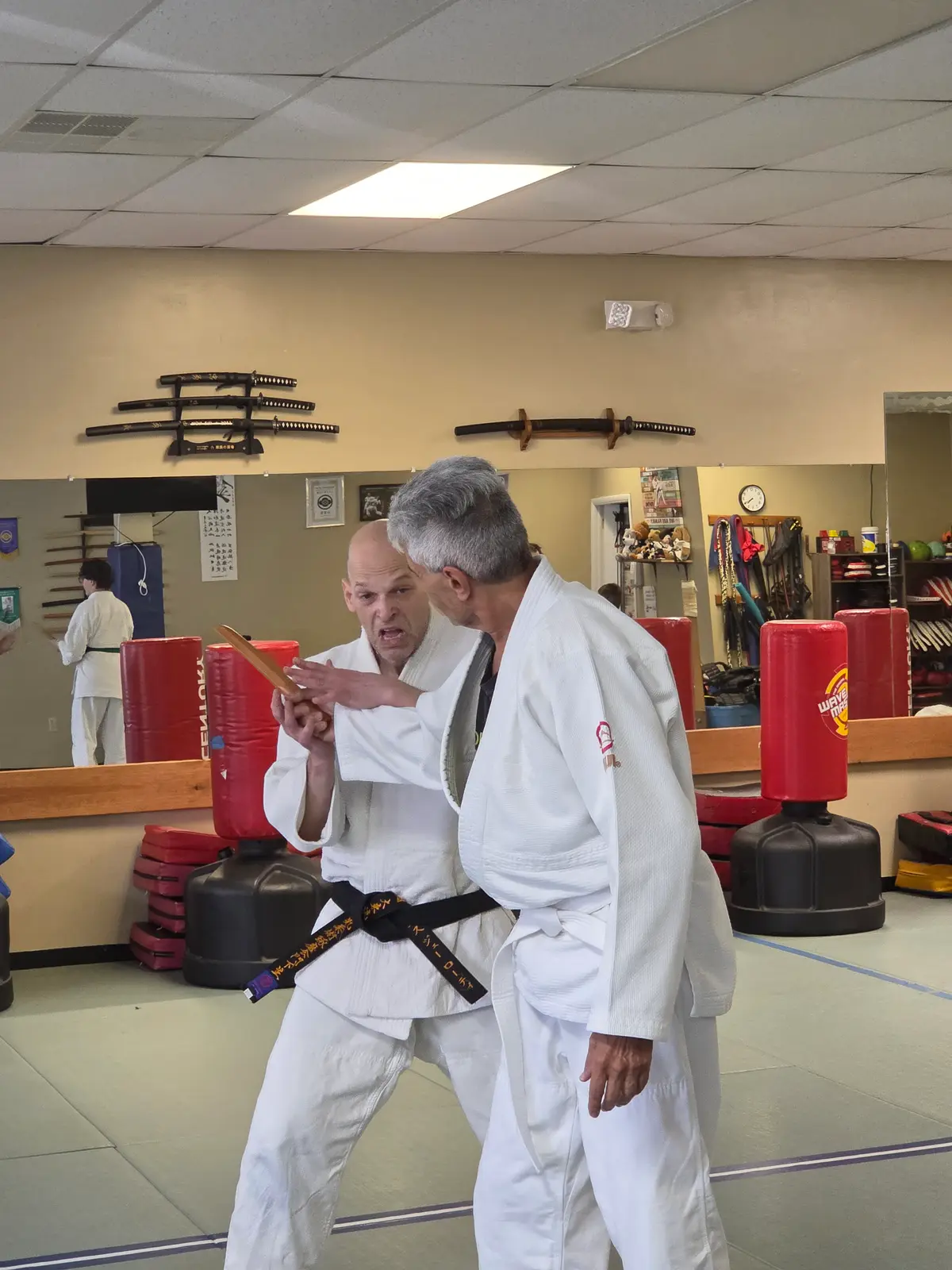 Instructor demonstrating a weapon technique